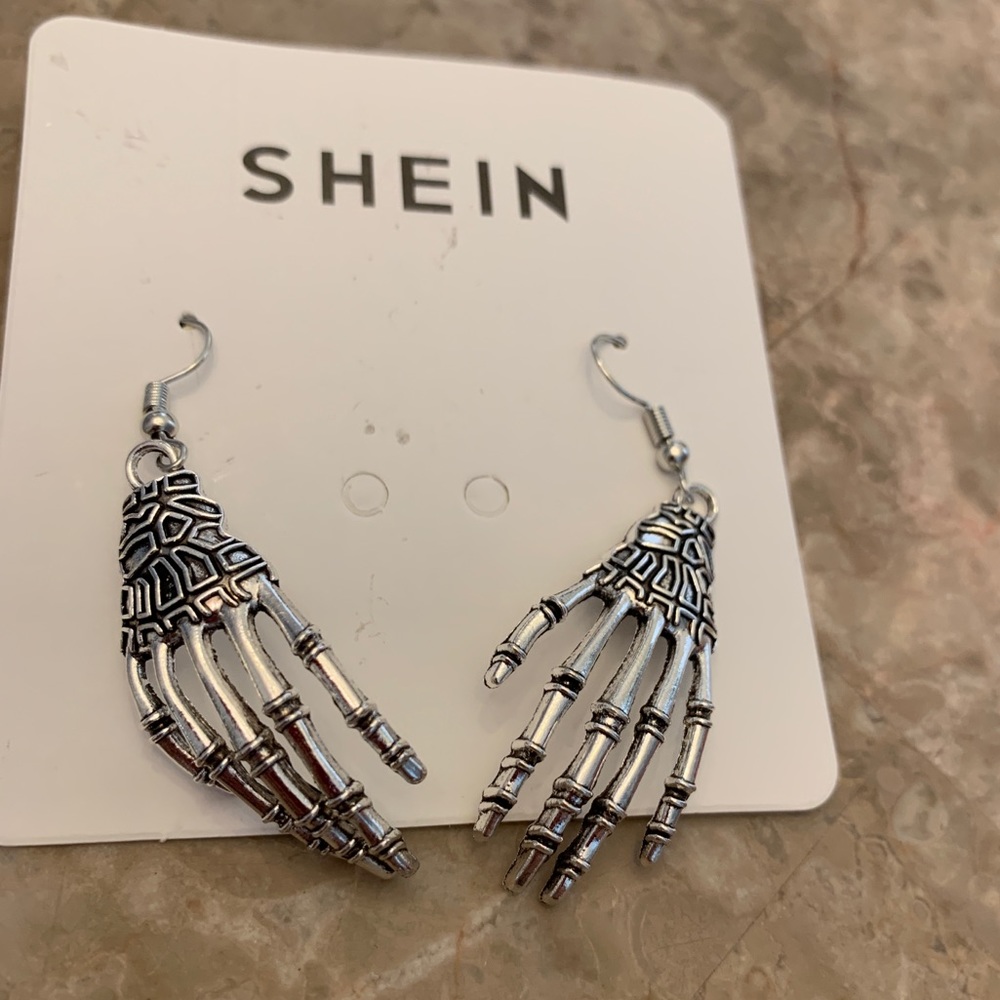 Halloween silver tone goth skeleton hand hook earrings